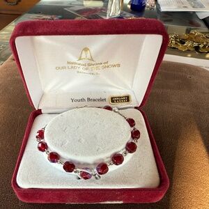 ADORABLE YOUTH BRACELET GARNET AND SILVER OUR LADY OF THE SNOWS. MINT